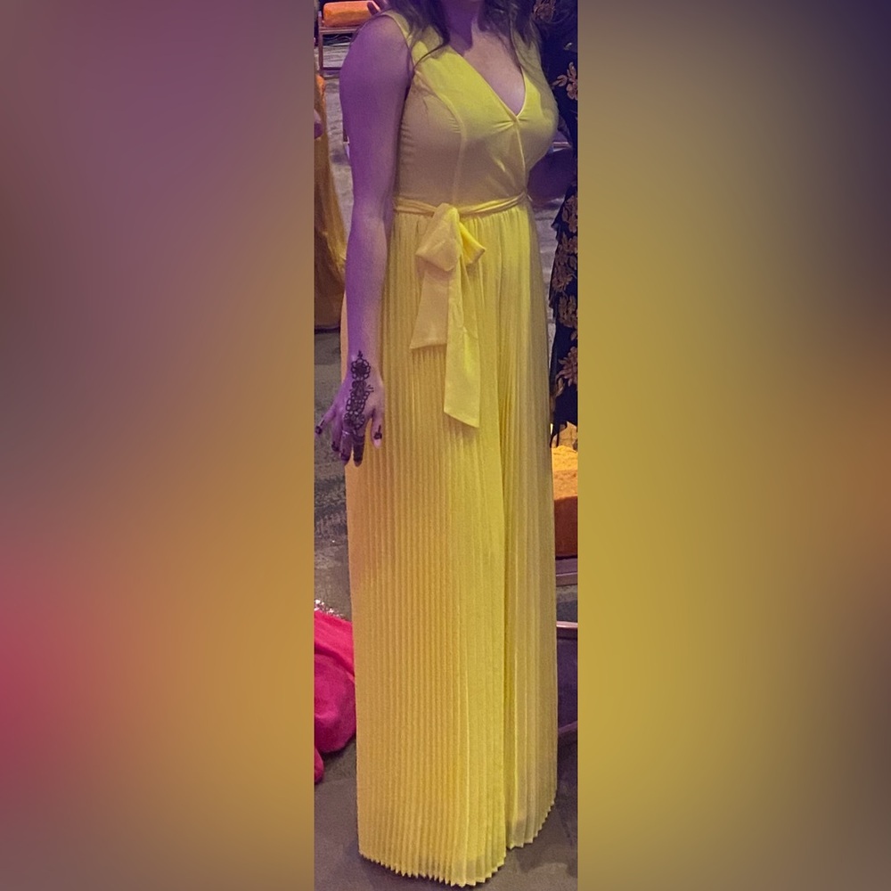 Yellow jumpsuit. Pleated size small.